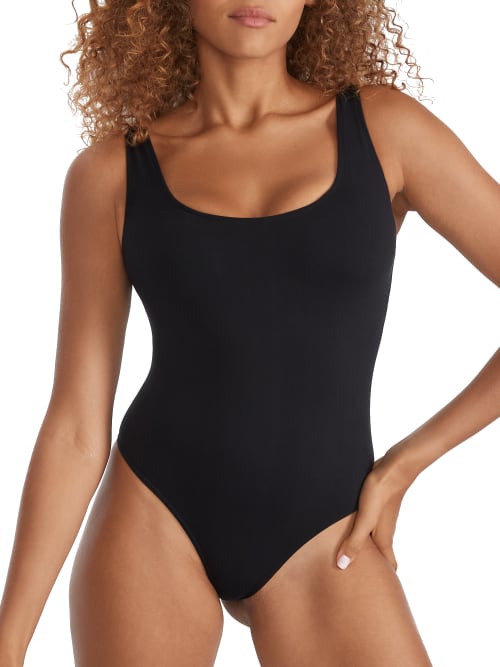 Shop Bare The Smoothing Seamless Bodysuit In Black