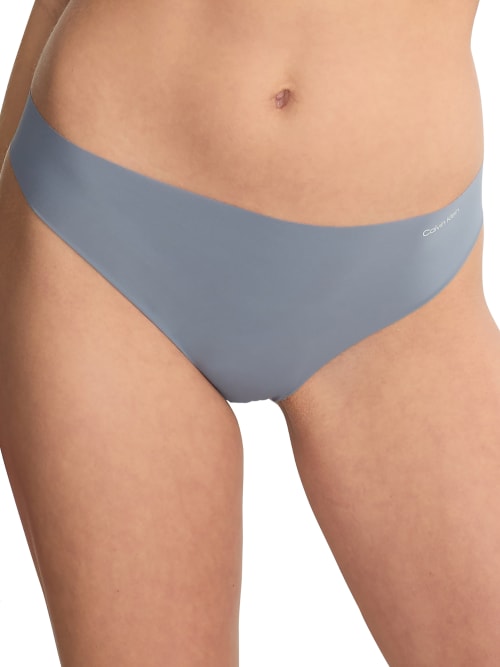 Shop Calvin Klein Invisibles Thong In Flint Stone