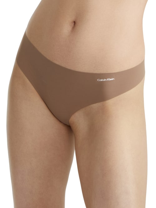 Shop Calvin Klein Invisibles Thong In Mauve Brown