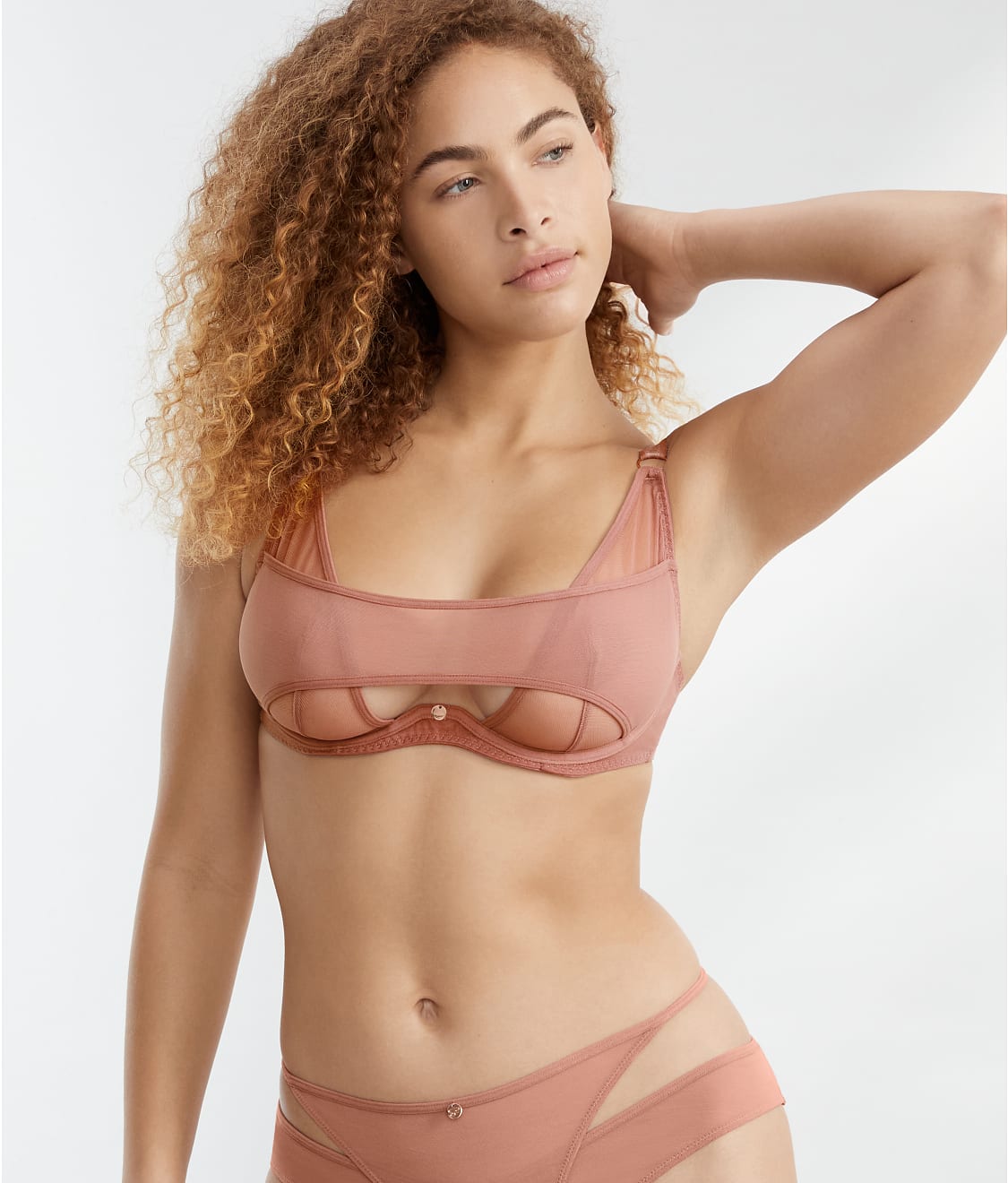 Peek-a-Boo Bras: Peep Show Lingerie Reveals the Essentials, Obscures the  Rest